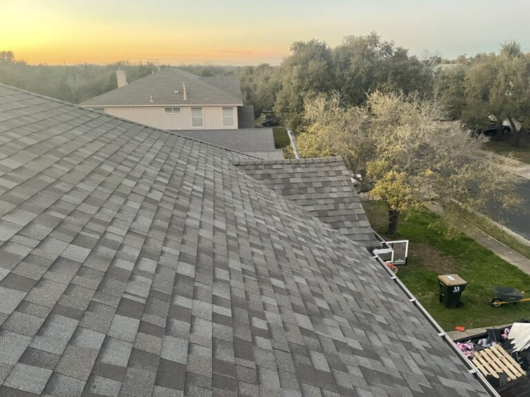 completed asphalt shingle roof replacement on a residential house in Hutto TX